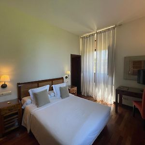 Habitación Estándar con Cama Queen